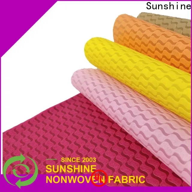 Sunshine professional non woven embossing design for covers