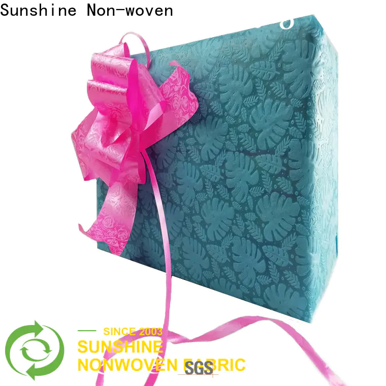 Sunshine pattern non woven embossing design for covers
