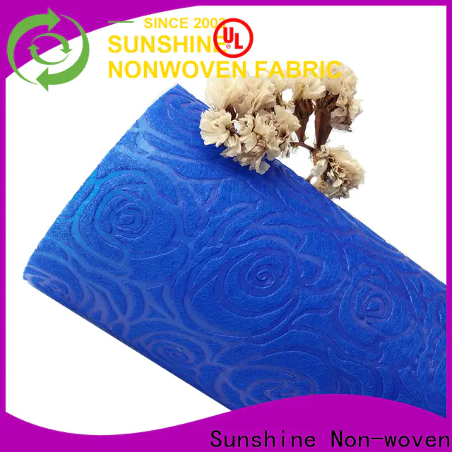 Sunshine colorful non woven embossing with good price for tablecloth