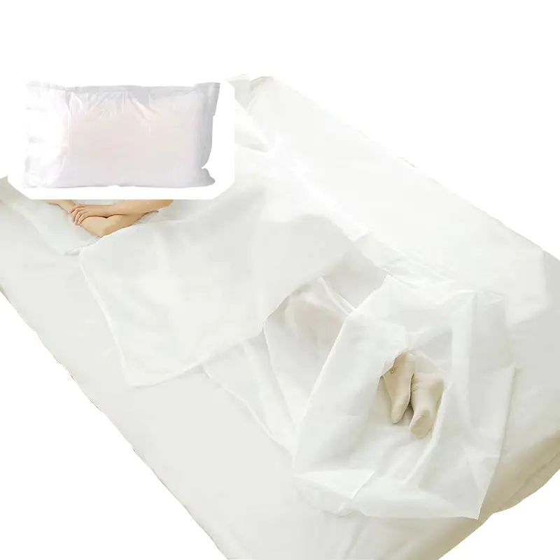 High quality low price 100% pp nonwoven disposable bed four-piece set disposable bedding set for hotel used