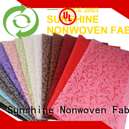 bright non woven embossing flower manufacturer for tablecloth